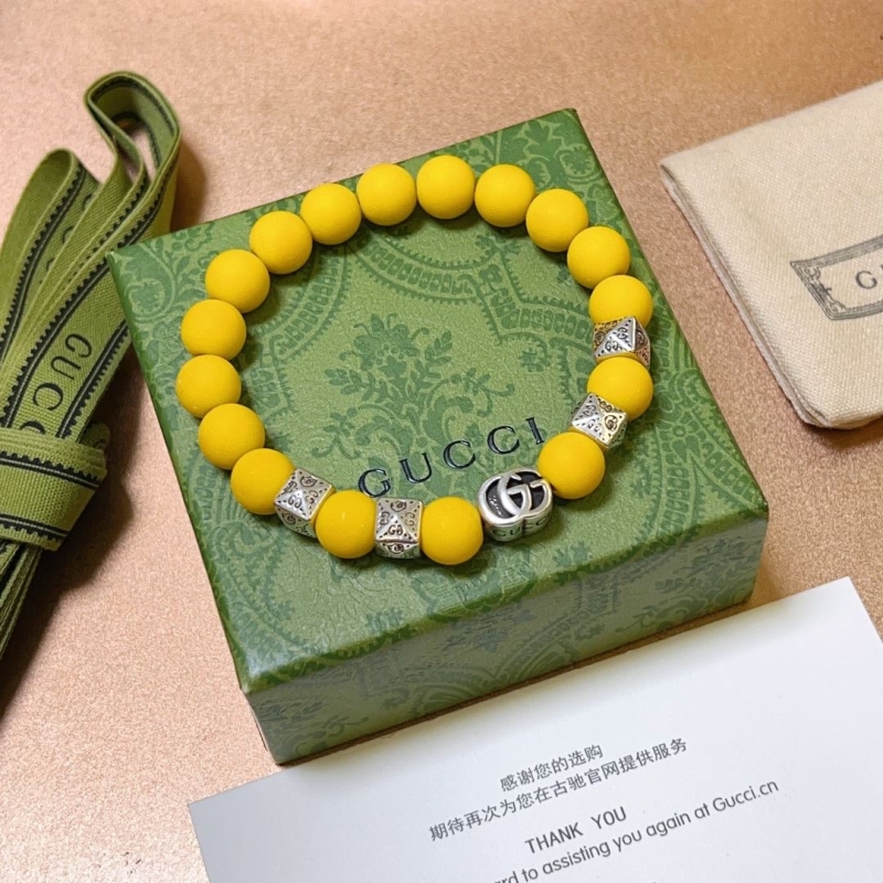 G*u*i bracelets